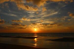 Lighting and color of the sky above the horizon at sunset. photo