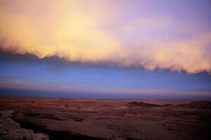 Lighting and color of the sky above the horizon at sunset. photo