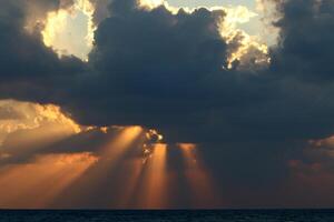 Lighting and color of the sky above the horizon at sunset. photo