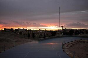 Lighting and color of the sky above the horizon at sunset. photo