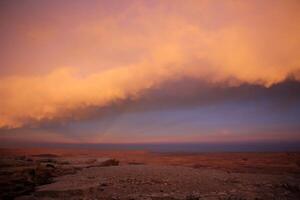 Lighting and color of the sky above the horizon at sunset. photo