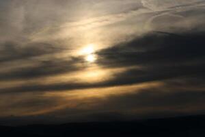 Lighting and color of the sky above the horizon at sunset. photo