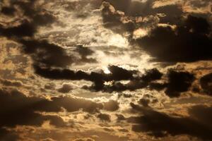 Lighting and color of the sky above the horizon at sunset. photo