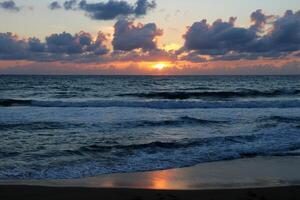 Lighting and color of the sky above the horizon at sunset. photo