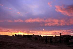 Lighting and color of the sky above the horizon at sunset. photo