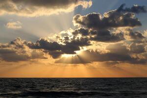 Lighting and color of the sky above the horizon at sunset. photo