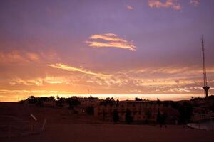 Lighting and color of the sky above the horizon at sunset. photo