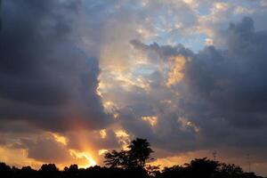 Lighting and color of the sky above the horizon at sunset. photo