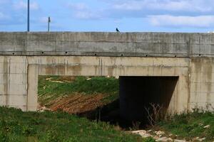 The bridge was built over a gorge and a water obstacle. photo