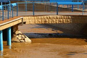 The bridge was built over a gorge and a water obstacle. photo