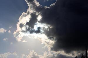 Rain clouds in the sky over the Mediterranean Sea. photo