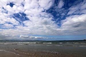 Rain clouds in the sky over the Mediterranean Sea. photo