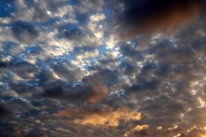 Rain clouds in the sky over the Mediterranean Sea. photo