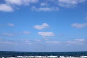 Rain clouds in the sky over the Mediterranean Sea. photo