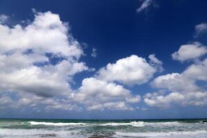 Rain clouds in the sky over the Mediterranean Sea. photo