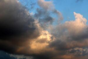 Rain clouds in the sky over the Mediterranean Sea. photo