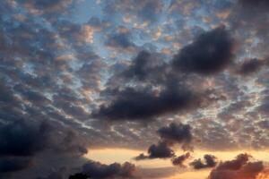 Rain clouds in the sky over the Mediterranean Sea. photo