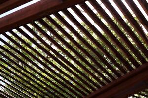 Canopy for protection from the hot sun in a city park. photo