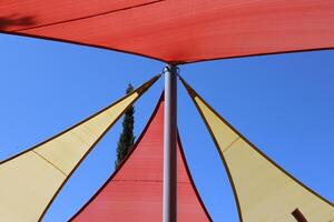 Canopy for protection from the hot sun in a city park. photo