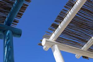 Canopy for protection from the hot sun in a city park. photo