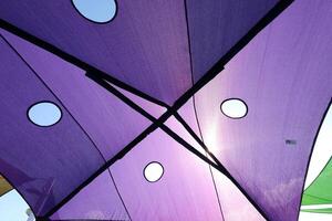 Canopy for protection from the hot sun in a city park. photo