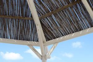 Canopy for protection from the hot sun in a city park. photo