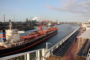 On the upper deck of a large ocean liner. photo