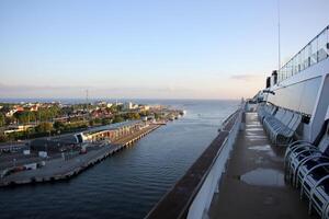 On the upper deck of a large ocean liner. photo