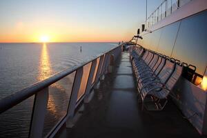 On the upper deck of a large ocean liner. photo