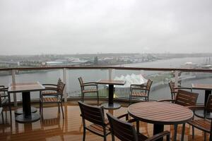 On the upper deck of a large ocean liner. photo