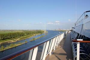 On the upper deck of a large ocean liner. photo