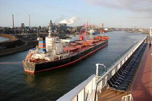 On the upper deck of a large ocean liner. photo