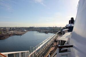 On the upper deck of a large ocean liner. photo