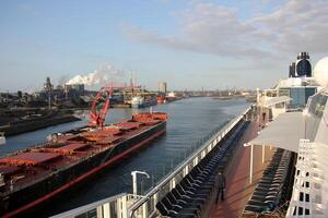 On the upper deck of a large ocean liner. photo