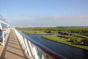 On the upper deck of a large ocean liner. photo