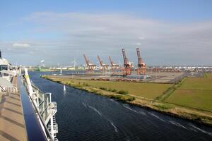 On the upper deck of a large ocean liner. photo