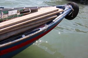 A pier on the shore for mooring boats and yachts. photo