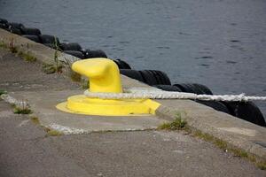 A pier on the shore for mooring boats and yachts. photo