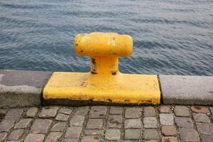 A pier on the shore for mooring boats and yachts. photo