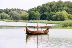 A pier on the shore for mooring boats and yachts. photo