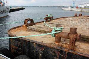 A pier on the shore for mooring boats and yachts. photo