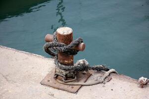 A pier on the shore for mooring boats and yachts. photo