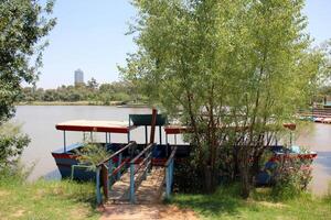 A pier on the shore for mooring boats and yachts. photo