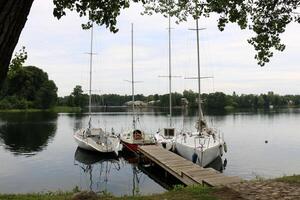 A pier on the shore for mooring boats and yachts. photo