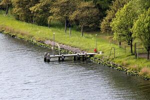 A pier on the shore for mooring boats and yachts. photo