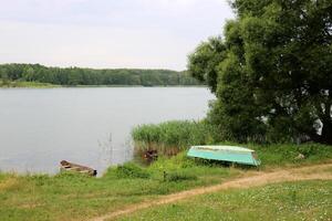 A pier on the shore for mooring boats and yachts. photo