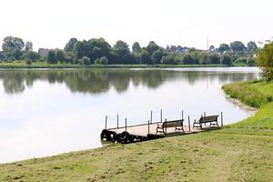 A pier on the shore for mooring boats and yachts. photo