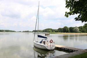 A pier on the shore for mooring boats and yachts. photo