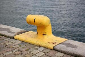 A pier on the shore for mooring boats and yachts. photo