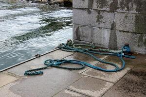 A pier on the shore for mooring boats and yachts. photo